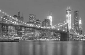 City at night with a bridge connecting it