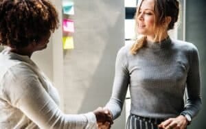 Two People Shaking Hands